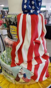 Flag of the United States of America draped in fondant down four tiers