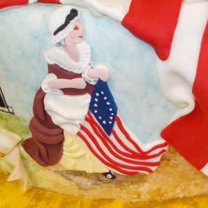 mural of Betsy Ross sewing the American colonial flag