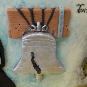 The Liberty Bell in fondant relief