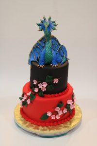 Dragon birthday cake with fondant cherry blossoms