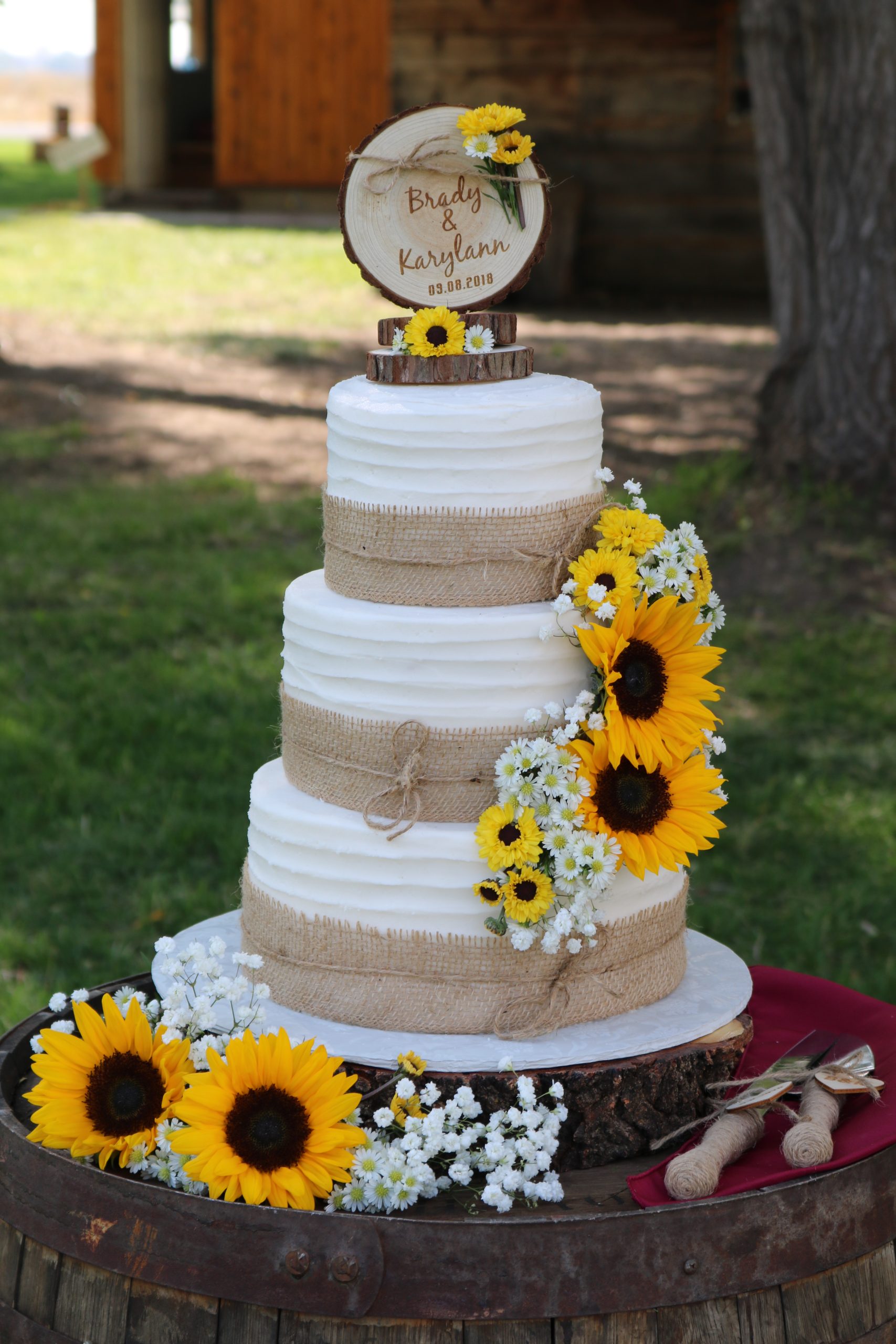 3 Tier Sunflowers & Burlap Wedding Cake – Rexburg Cakes 3 Tier Sunflowers & Burlap Wedding Cake – Rexburg Cakes